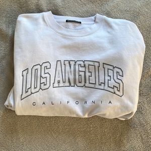 Brandy Melville white “Los Angeles” crewneck sweatshirt